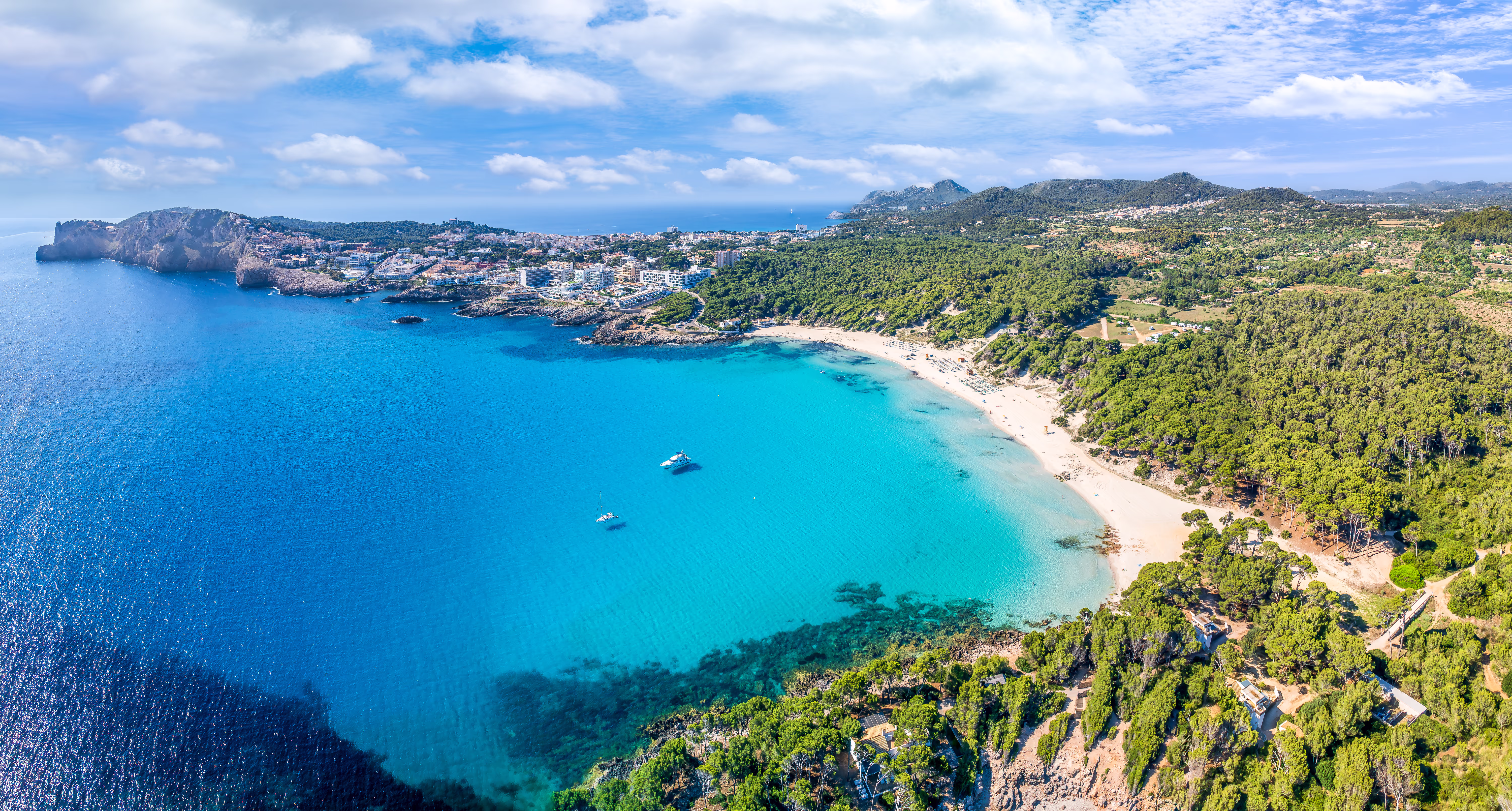 Cala Ratjada - Two lonely little boats in beautiful turquoise water