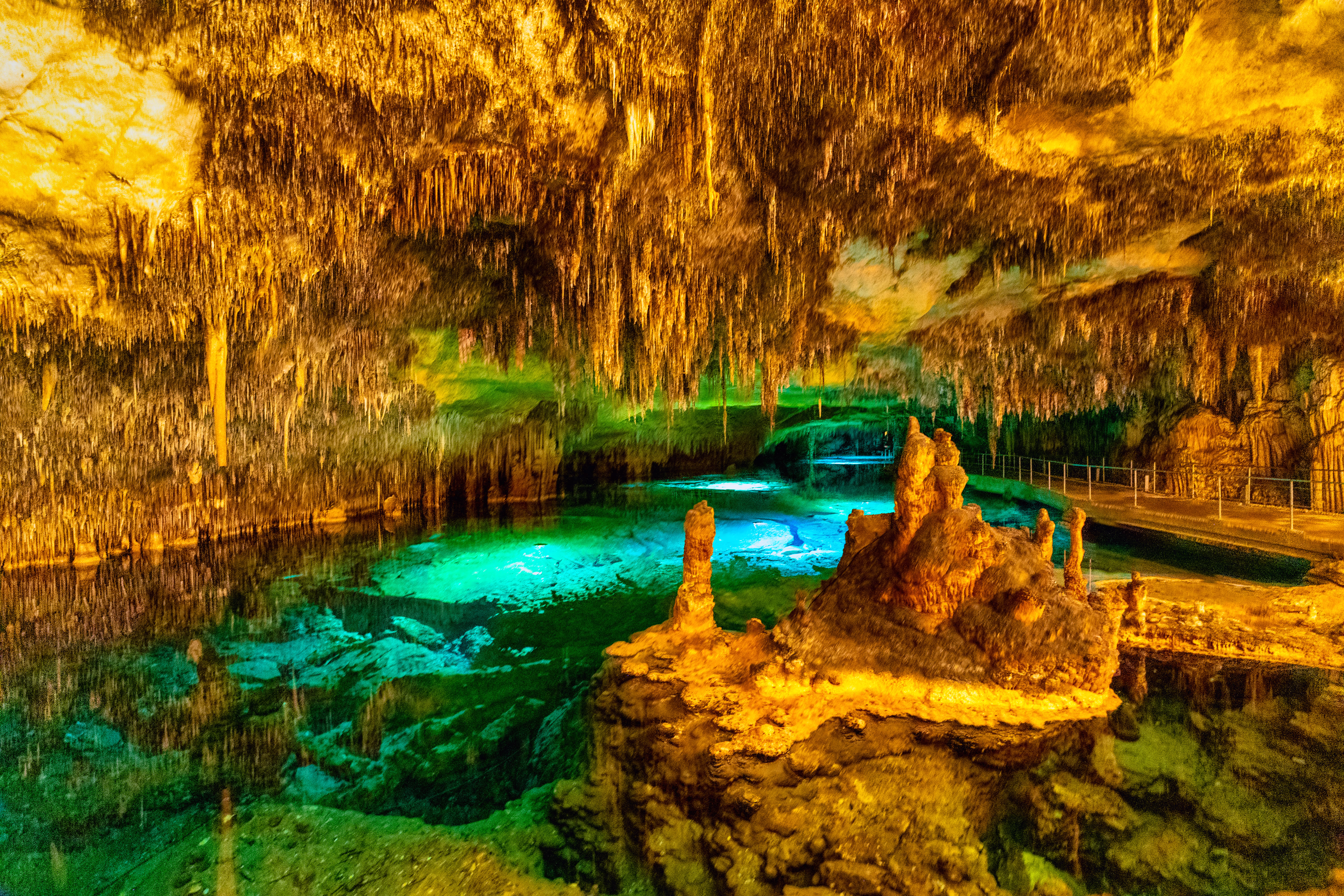 The Dragon Cave of Porto Cristo with a large underground lake, considered one of the largest in the world The Dragon Cave of Porto Cristo with a large underground lake, considered one of the largest in the world