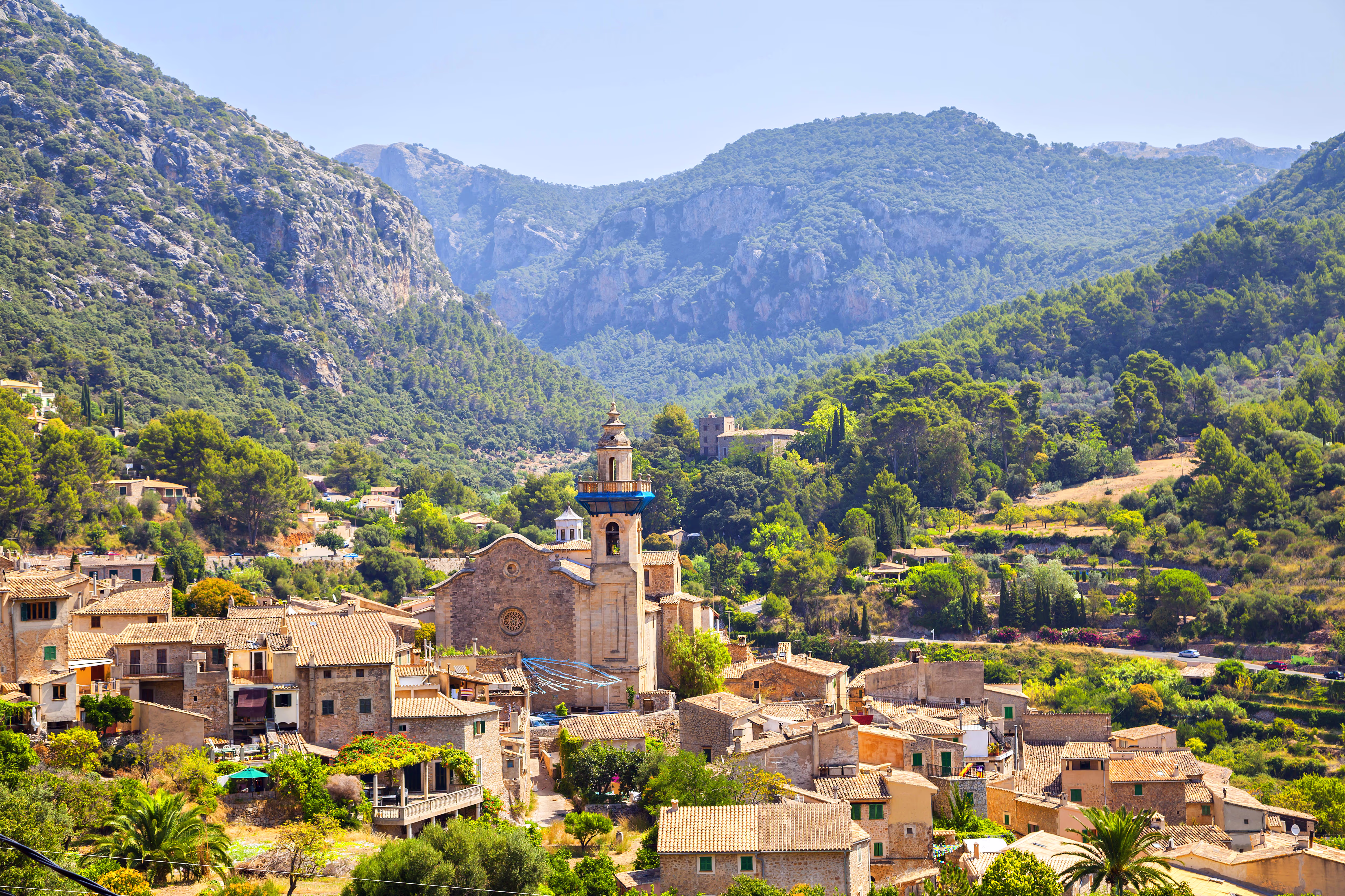 Valldemossa, a quaint village situated at an elevation of 400 meters, surrounded by the Tramuntana Mountains Valldemossa, a quaint village situated at an elevation of 400 meters, surrounded by the Tramuntana Mountains