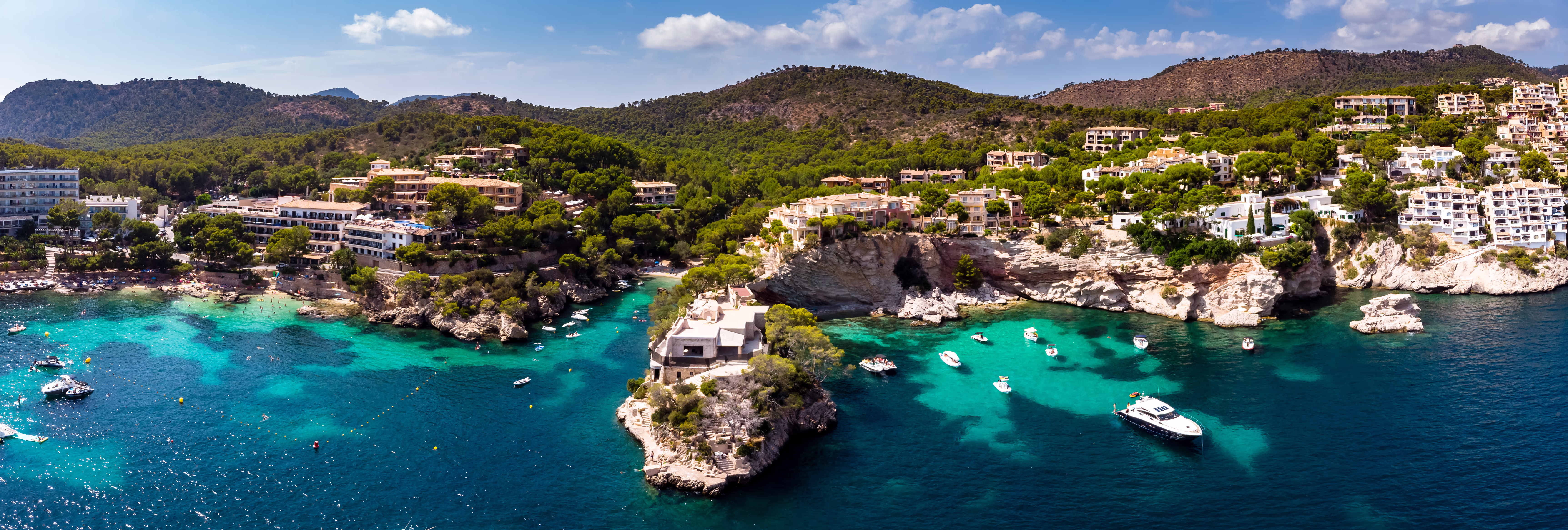 Aerial view of Cala Fornells with small coves and a small harbor