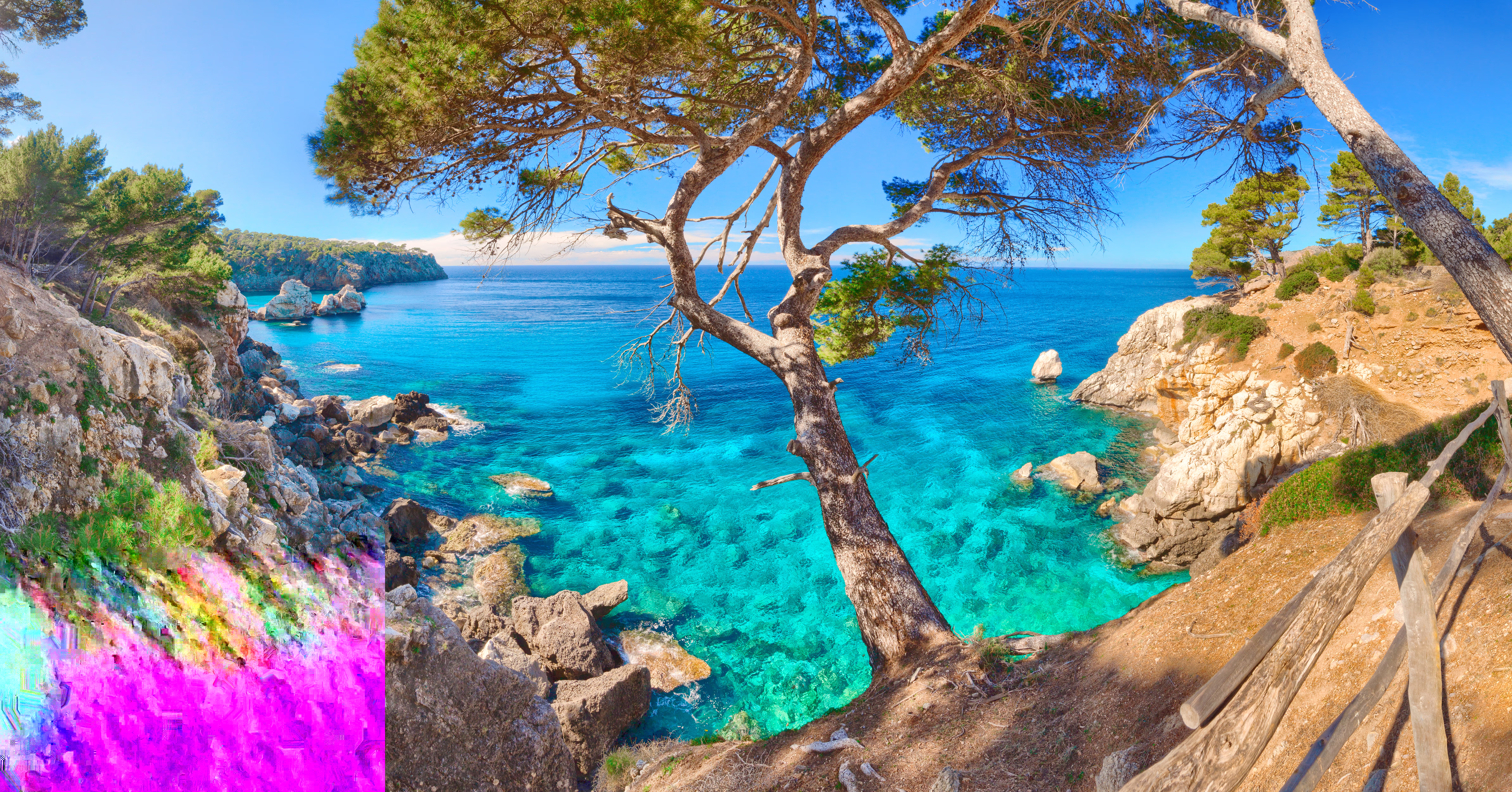 Bird’s-eye view with crystal-clear turquoise water in Deia's cove