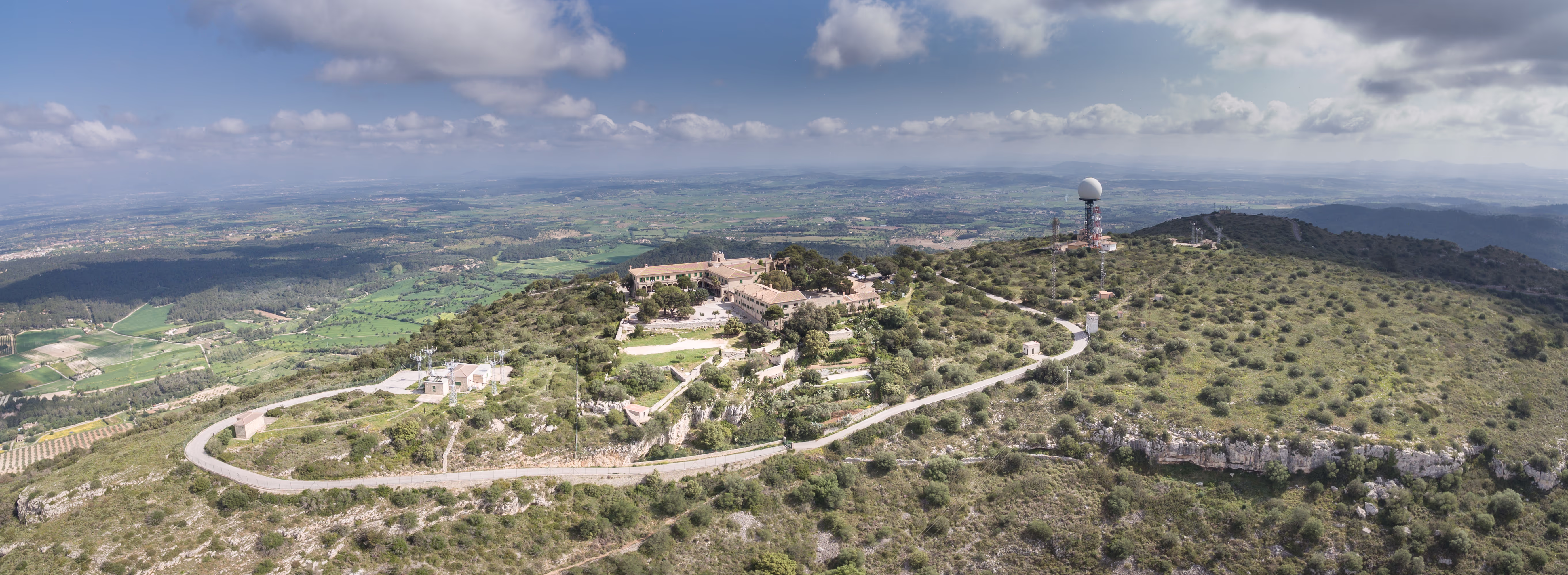 Aerial view of Randa with the old monastery and weather station Aerial view of Randa with the old monastery and weather station