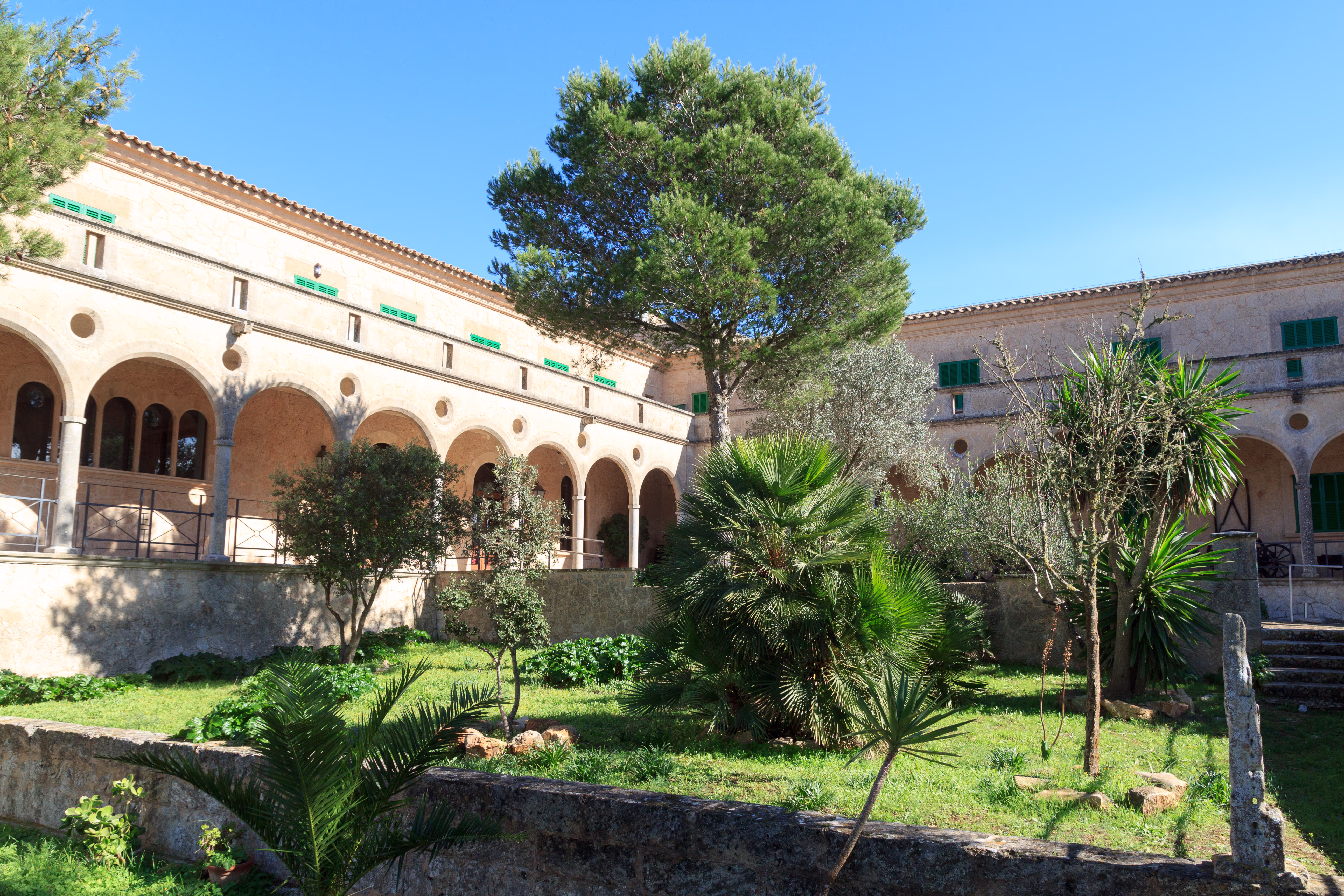 Courtyard of the monastery in Randa with beautiful planting Courtyard of the monastery in Randa with beautiful planting